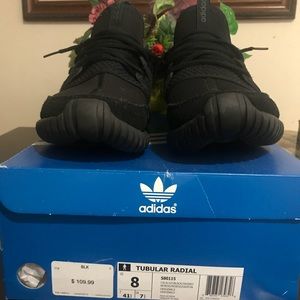 Adidas all black tubular radial